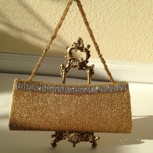 Hand beaded gold clutch